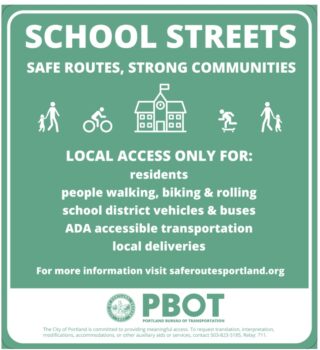 Green sign reading 'School Streets' with icons of people walking and rolling to school